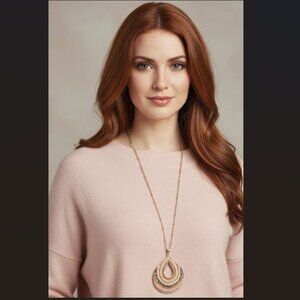 NECKLACE - Long gold and pink beaded medallion